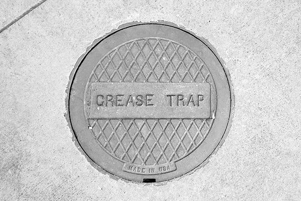 neglecting grease trap pumping can lead to clogs, foul odors, and potential fines for non-compliance with regulations